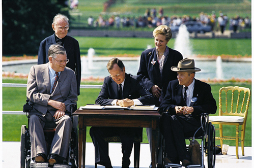 President George H.W. Bush signing the ADA in 1990.