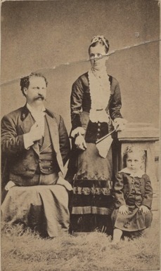 Eli Bowen with his wife and child